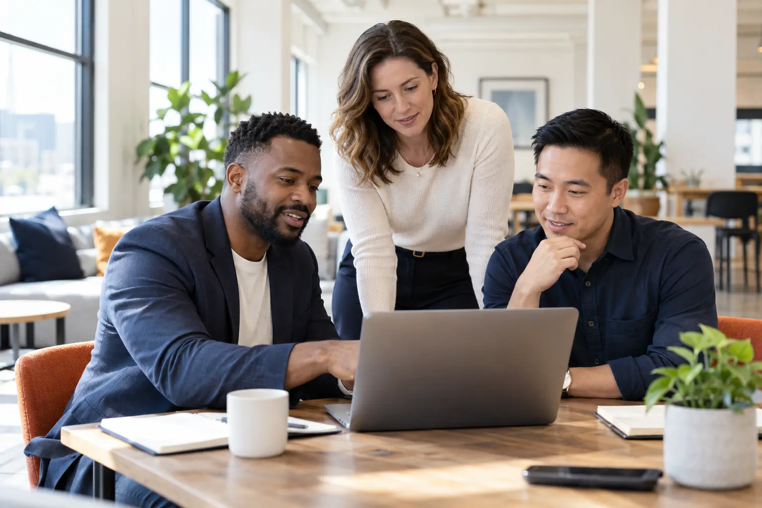 Illustrative scene of a business team reviewing its security service with an adviser